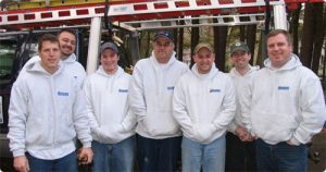 An image of our Seacoast Replacement Windows crew in their white sweatshirts.