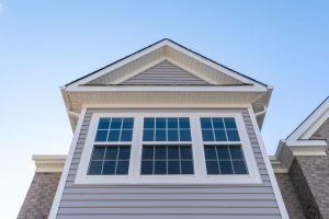 Double hung windows featured on a house.